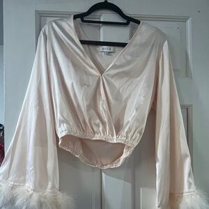Satin dramatic blouse with feathery sleeves